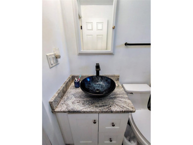 Waterfront -- Situated on an oversized corner canal lot with - photo 29
