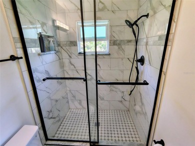 Waterfront -- Situated on an oversized corner canal lot with - photo 30