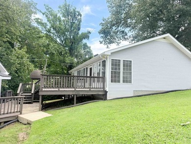This waterfront home sits on Pickwick Lake. With 119 ft of - photo 31