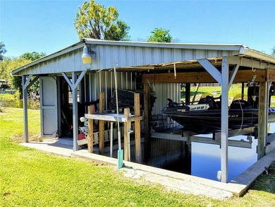 Waterfront -- Situated on an oversized corner canal lot with - photo 34