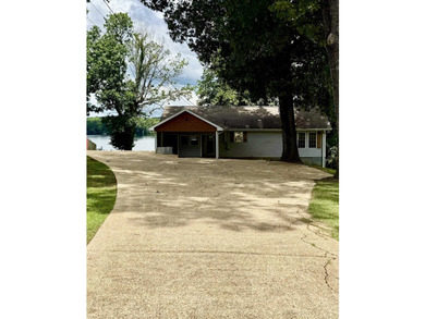 This waterfront home sits on Pickwick Lake. With 119 ft of - photo 34