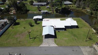 Waterfront -- Situated on an oversized corner canal lot with - photo 40