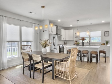 Welcome to 139 Sabal Court, a truly exceptional townhome in