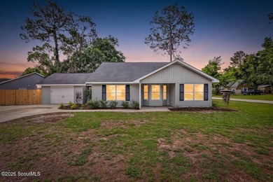 LIKE NEW and completely renovated from top to bottom, this - photo 1