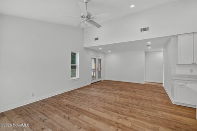 LIKE NEW and completely renovated from top to bottom, this - photo 2