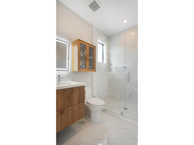 The home offers custom millwork and high-end finishes. Enjoy