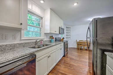 This beautifully renovated brick ranch awaits its new owners in - photo 15