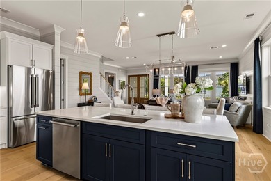 As the Model Home for The Isling, Lot 46 showcases the Wymberly - photo 15