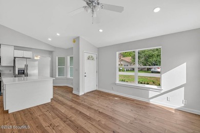 LIKE NEW and completely renovated from top to bottom, this - photo 6