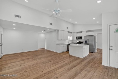 LIKE NEW and completely renovated from top to bottom, this - photo 7