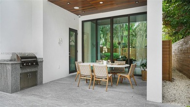 The home offers custom millwork and high-end finishes. Enjoy