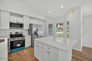 LIKE NEW and completely renovated from top to bottom, this - photo 10