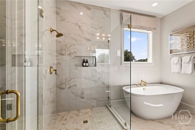 As the Model Home for The Isling, Lot 46 showcases the Wymberly - photo 29