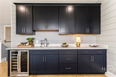 As the Model Home for The Isling, Lot 46 showcases the Wymberly - photo 45