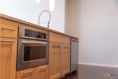 Experience elevated living at BartonPlace with this top-floor - photo 3