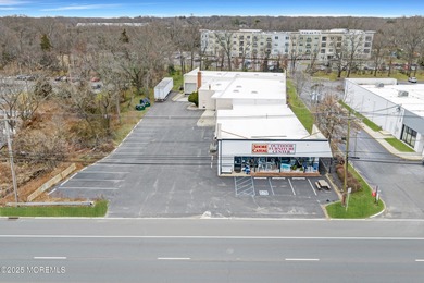 Great buy! Warehouse plus retail in prime location on Rt 35 - photo 2