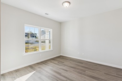 The Magnolia plan by Smith Family Homes is under construction in - photo 3