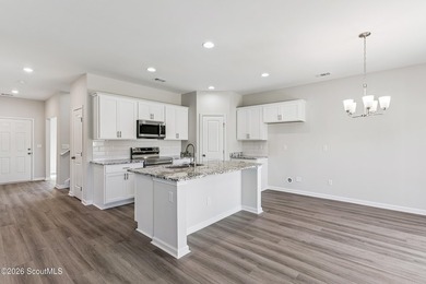 The Magnolia plan by Smith Family Homes is under construction in - photo 5