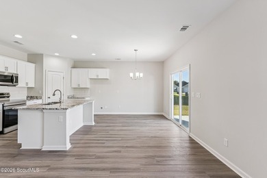 The Magnolia plan by Smith Family Homes is under construction in - photo 6