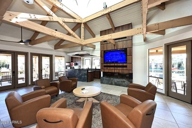 Ideal interior location with south facing patios on the big - photo 20