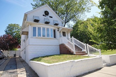 2 family 5/5 plus. Finished basement, large yard. Close to - photo 1
