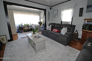 2 family 5/5 plus. Finished basement, large yard. Close to - photo 4