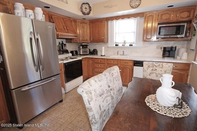 2 family 5/5 plus. Finished basement, large yard. Close to - photo 6