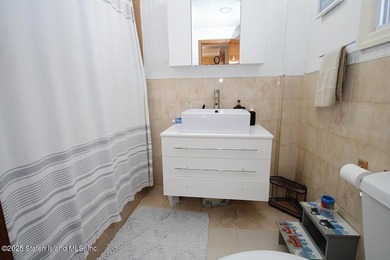 2 family 5/5 plus. Finished basement, large yard. Close to - photo 9