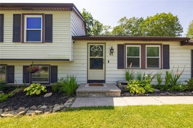 Welcome home to this beautifully updated split-level in the - photo 2