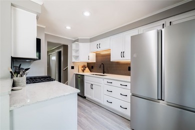 Welcome home to this beautifully updated split-level in the - photo 4