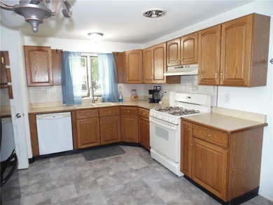 Move right into this well-maintained 4-bedroom Cape Cod in the - photo 2