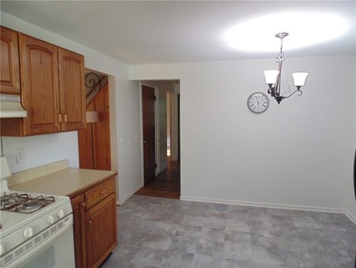Move right into this well-maintained 4-bedroom Cape Cod in the - photo 3
