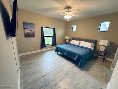 This beautiful nearly brand new home is priced to sell and in an - photo 6