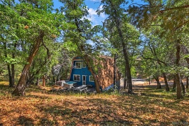 Tucked among the trees in the desirable Moonridge neighborhood - photo 4