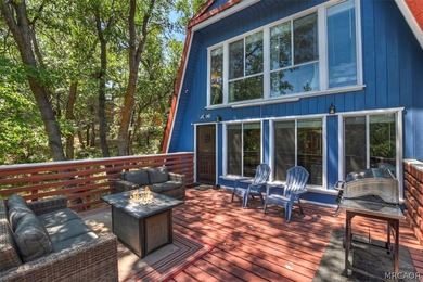 Tucked among the trees in the desirable Moonridge neighborhood - photo 6