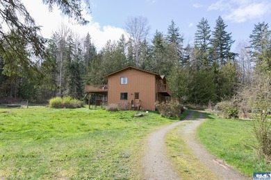 Nestled on 5 private acres in Sequim, this stunning 3 - photo 3