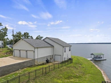 Welcome to this stunning lake house situated on the serene - Lake Home For Sale in Pittsburg, Texas