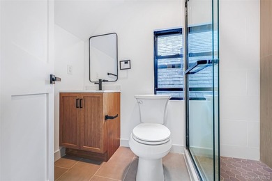 Welcome to this beautiful renovated single-family home in the - photo 12