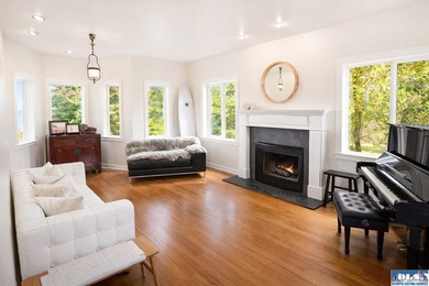 From the water's edge to the summit above, this rare 10-acre - photo 4