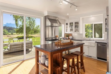 From the water's edge to the summit above, this rare 10-acre - photo 7