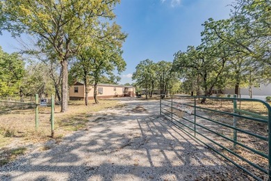 Lake Home For Sale in Millsap, Texas