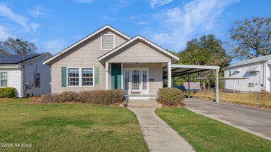 This delightful home offers spacious rooms with easy access to - photo 1