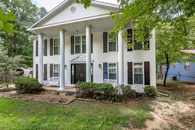 Step into a world of elegance & comfort with this remarkable - Lake Home For Sale in Fairfield Bay, Arkansas