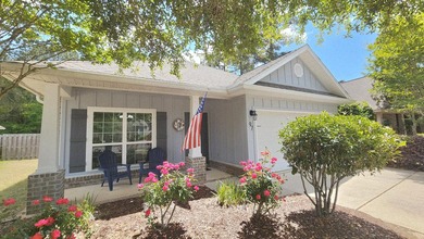 Resort-style living in Hammock Bay at 97 Dickens Drive! Located - photo 1