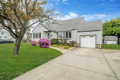 This spacious five-bedroom, two-full-bath corner-lot home in - photo 1