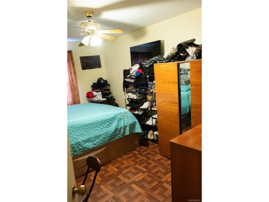 Welcome to this well-maintained two-family brick home located in - photo 7