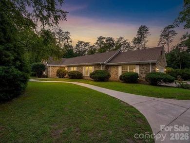 This newly renovated brick ranch home is hidden and secluded - photo 1