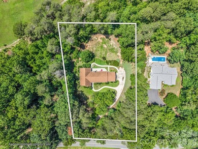 This newly renovated brick ranch home is hidden and secluded - photo 3