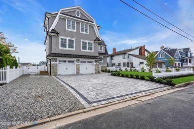 Curtis Point waterfront masterpiece by Charles Louis Custom