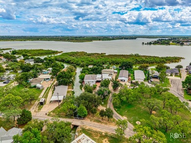 Stunning Lake Nasworthy home nestled along two canals with main - photo 2